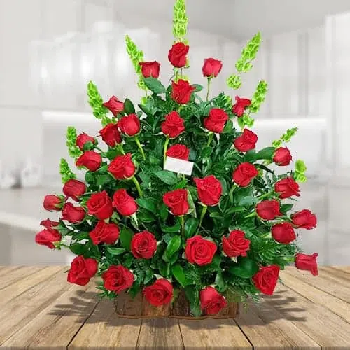 Cupid Floral Arrangement with Roses